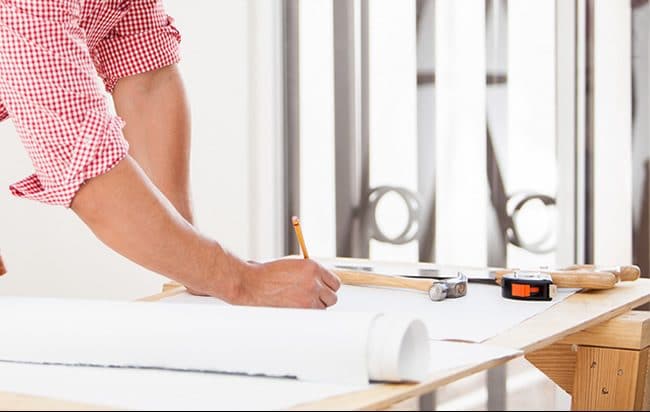 General contractor working on plans for a new home remodel